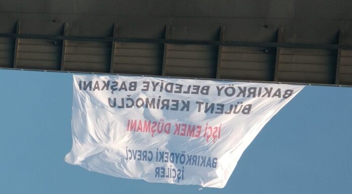 Grevdeki Bakırköy Belediyesi işçileri köprüye pankart astı, gözaltına alındı