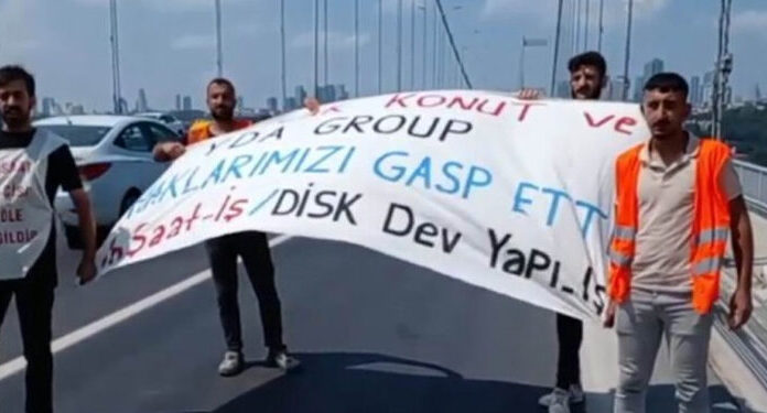Emlak Konut YDA Group’a karşı direnen işçiler Boğaziçi Köprüsü’nde eylem yaptı