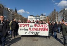 Suriye’deki Alevi katliamı Almanya’nın Köln kentinde binlerce kişinin katılımı ile protesto edildi